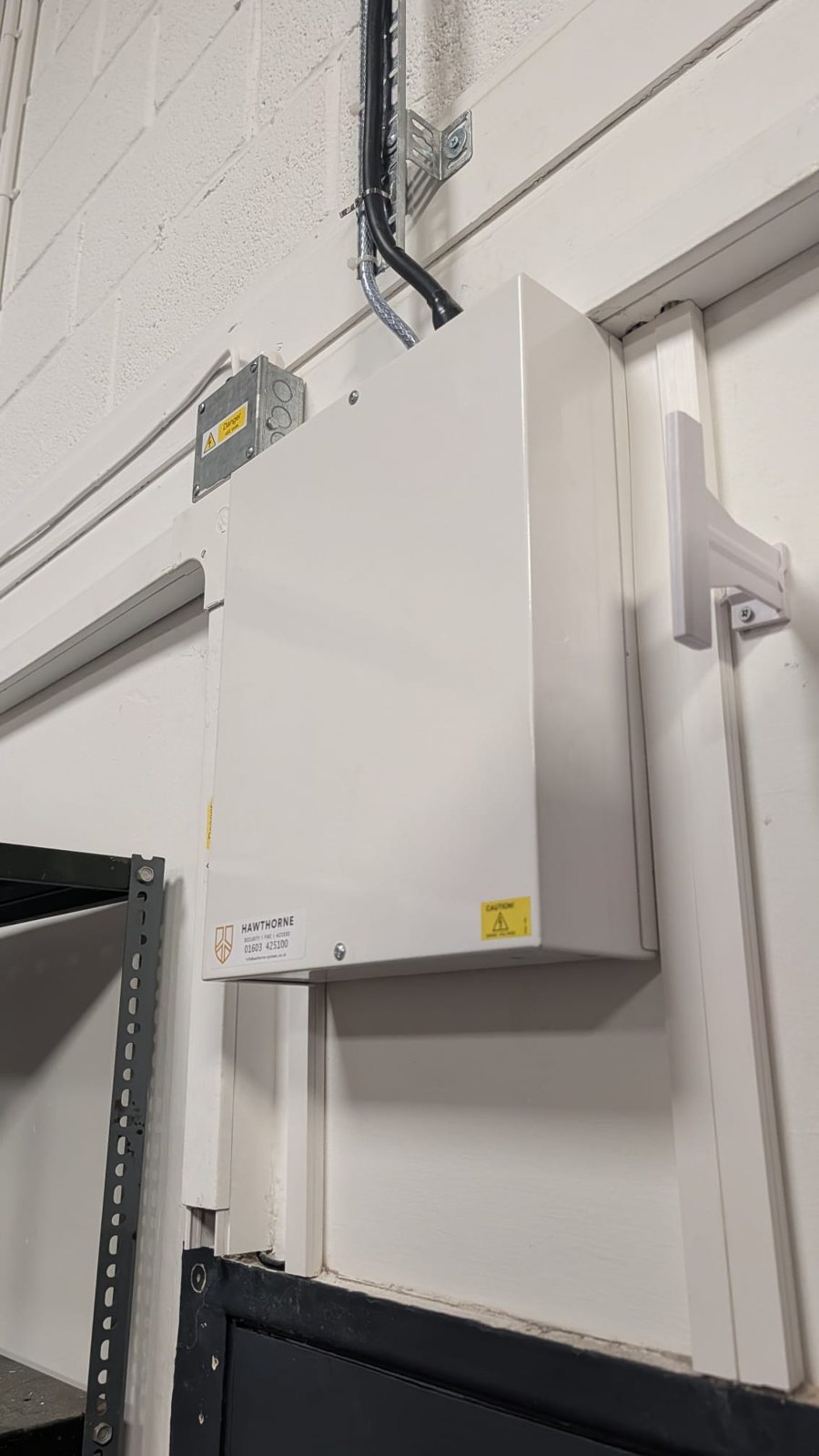 Labelled Hawthorne control equipment cabinet with cable containment