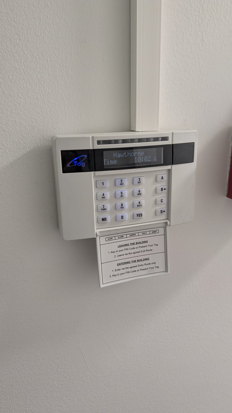 Intruder alarm keypad with Hawthorne shown on its display